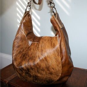 Handmade Marge and Rudy leather and brindle cow fur crossbody/shoulder bag.